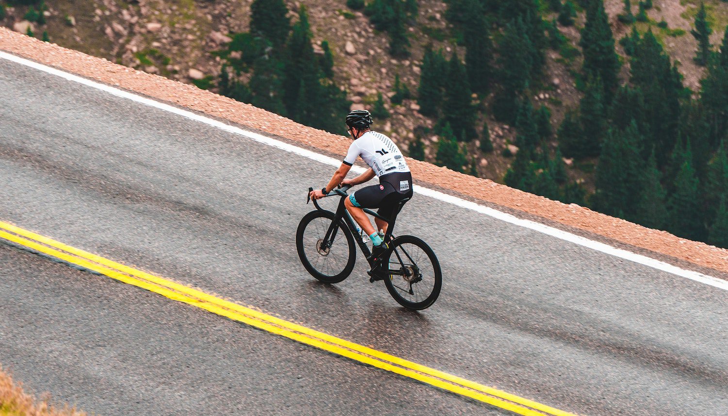 Man Riding a Bicycle on the Road Man Riding a Bicycle on the Road